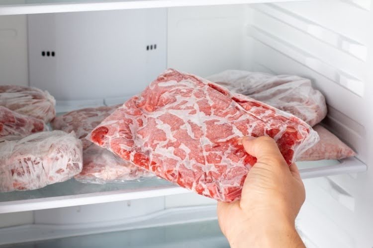 Properly stored frozen dog food kept in freezer-safe packaging.